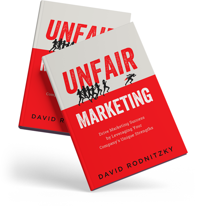 Two copies of the Unfair Marketing book