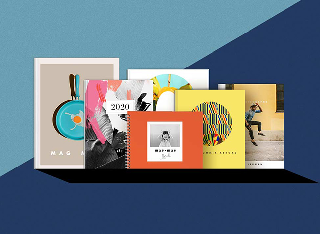 A collection of photo books, magazines, and calendars