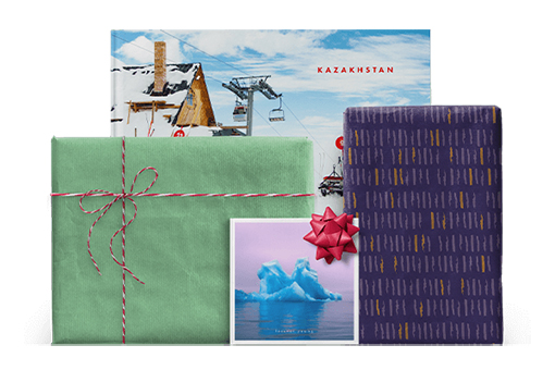 Photo books, some wrapped as presents