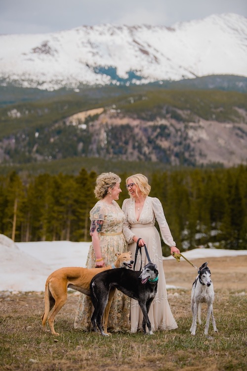 Erin, wife, and dogs on wedding day