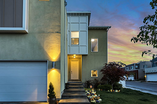 The front of a modern home at dusk