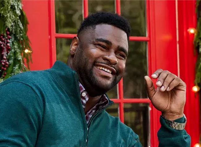 Man Smiling at Camera