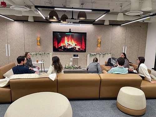 3Q/DEPT Chicago office couches and people sitting on them